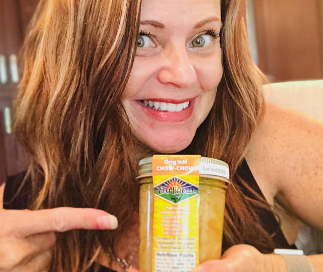 Woman with a jar of Chow-Chow